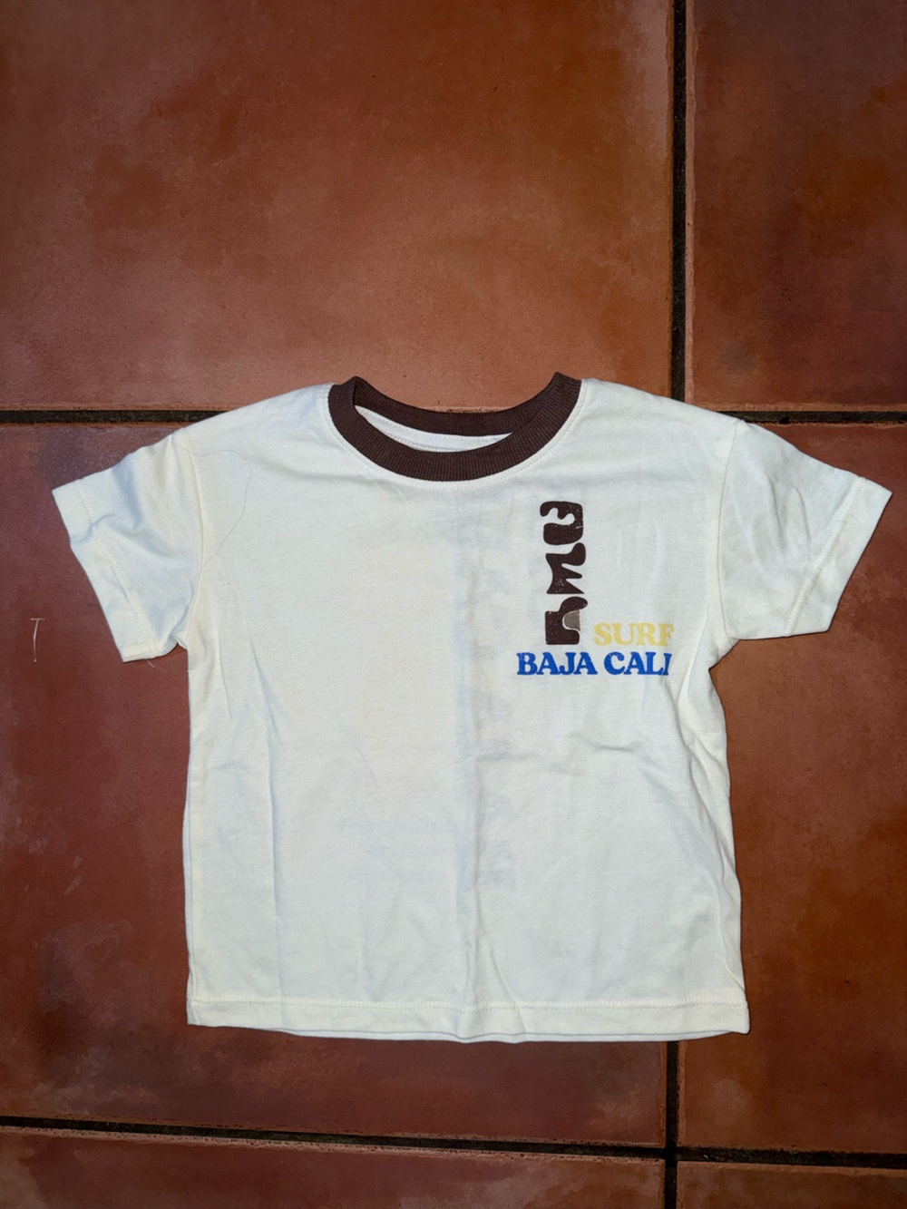 Grayson Threads White Tee with Brown Ringer and Multicolor Surf Graphic
